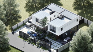 A birds-eye view of of 2 white storey houses semi-detached and joined on the side. The houses have green plants around them and are standing side by side