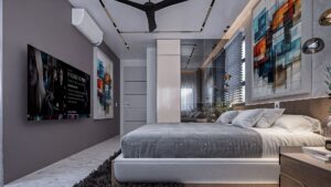 A house for sale in Accra Ghana. A luxury bedroom with a nicely laid bed with a white bedsheet. The bed view from the camera is a left side view