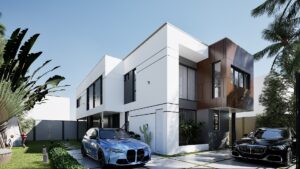 The front view of a luxury 4 bedroom house at Regimanuel Satellite City with 2 luxury cars parked in front of the building with beautiful landscaping behind it.