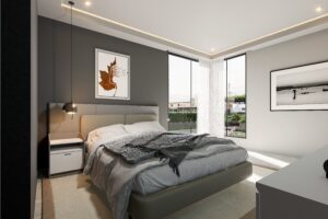 One of the Bedrooms of a 3 bedroom house for sale in Accra Ghana - showing the big glass widows merging at the corner of one side of the room - Regimanuel Satellite City
