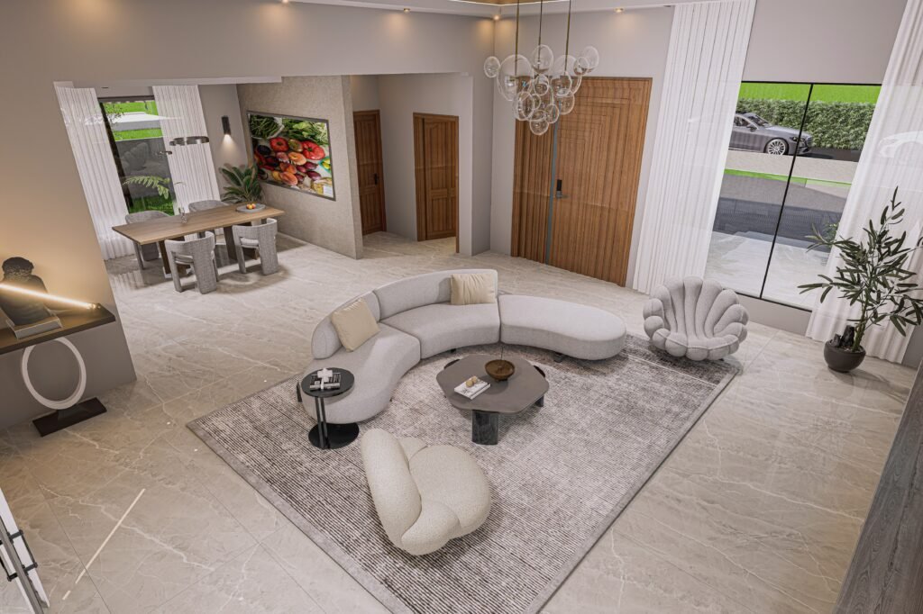 THE LIVING AREA OF A a 3 bedroom house for sale in Accra Ghana - SHOWING A CRESCENT SHAPED SOFA AT THE CENTRE OF THE LIVING ROOM - Regimanuel Satellite City