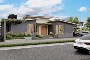 The main front view of a 3 bedroom house for sale in Accra Ghana - The building is grey with a street in front of it - Regimanuel Satellite City