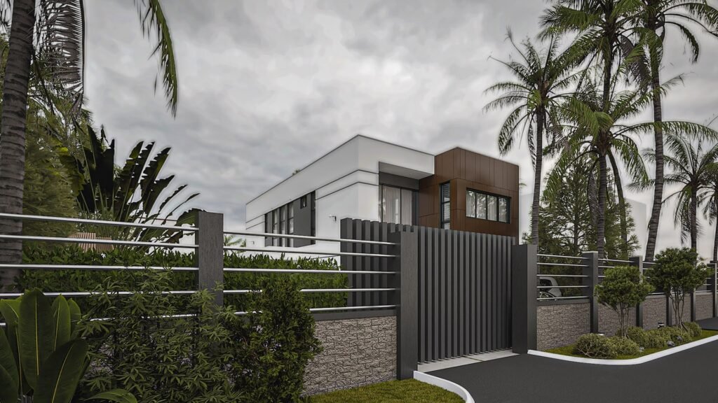 Houses For Sale in Accra with Off-Plan & Monthly Installments - A view from the front gate of a storey house. The walls are short with metal balusters that allow you to see the upper portion of the house.