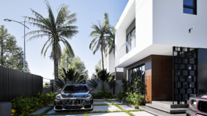 The front section of a white 3 bedroom storey house with a beautiful garden and trees dotted around the front with a black mercedes parked in front of the house.