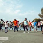 Residents at Regimanuel Gray Estates having a morning fitness routine on the tennis court at the estate's Club House - Ghana's Most Trusted Real Estate Developer